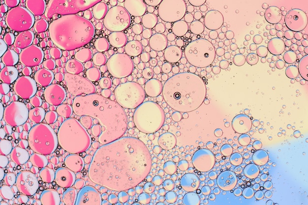 Roze olie-inkt bubbels en druppels