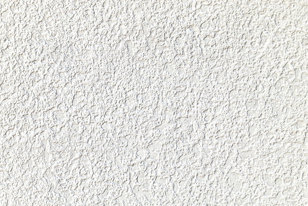Ruwe witte cement gepleisterde muurtextuur