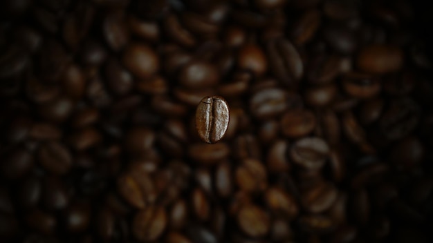 Selectieve focus van een geroosterde koffieboon onder de lichten met een wazige achtergrond