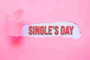 Gratis foto single's day banner met roze papier