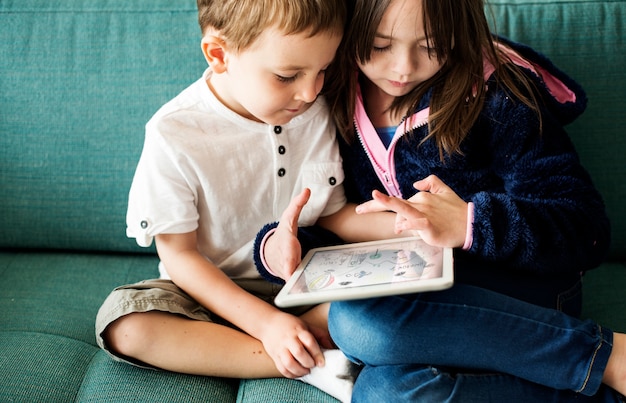 Sister Brother Playing Techie Digital Device