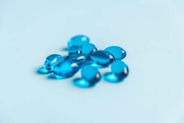 Sluit omhoog van blauwe medische gelcapsules