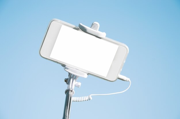 Smartphone op selfie stick close-up