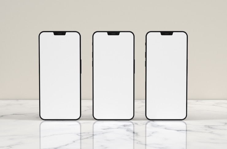 Gratis Foto smartphones op marmeren tafel
