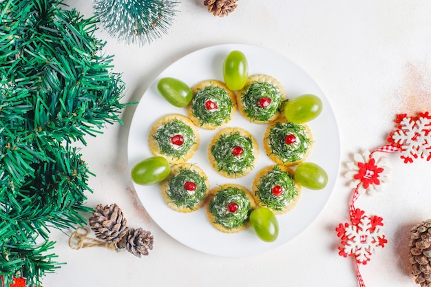 Snacks in de vorm van een kerstboom.