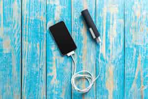 Gratis foto telefoon mobiel verbinden met batterij powerbank
