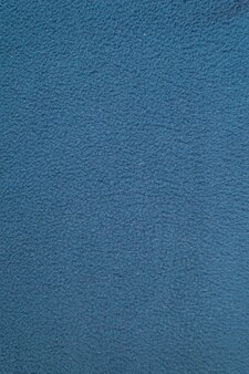 Textuur van blauwe niet-uniforme fleece katoenen stof