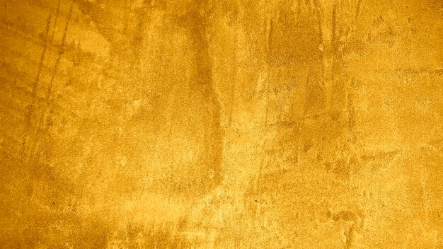 Textuur van gouden decoratieve gips of betonnen abstracte grunge achtergrond voor design
