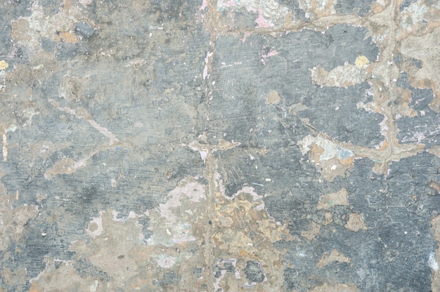 Textuur van grijze beschadigde muur