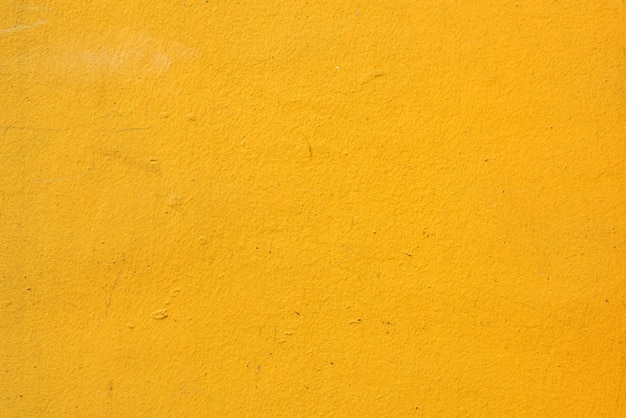 Textuur van oranje muur met enkele krasjes