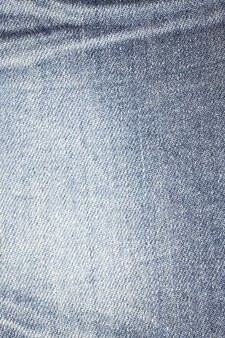Textuur van spijkerbroek close-up.