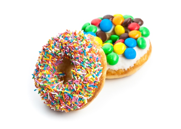 Verschillende donuts op witte achtergrond Premium Foto