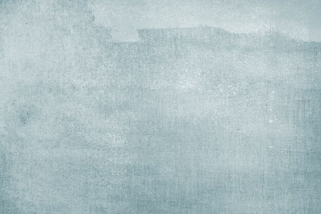 Vervaagde blauwe kleur op een canvas getextureerde achtergrond