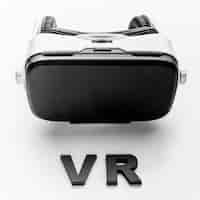 Gratis foto virtual reality headset op bureau