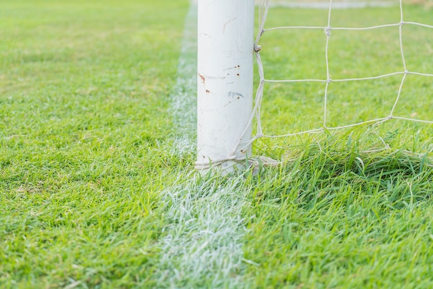 Gratis foto voetbal doel voetbal groen gras veld