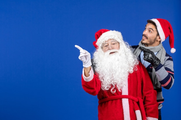 Vooraanzicht Kerstman met jong mannetje