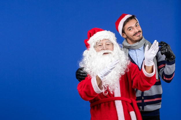 Vooraanzicht Kerstman met jong mannetje