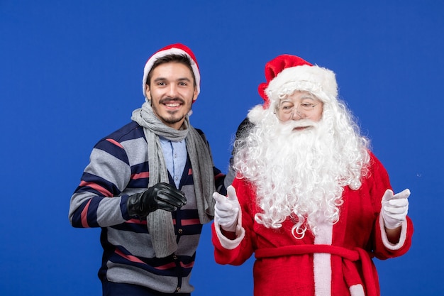 Vooraanzicht Kerstman met jong mannetje