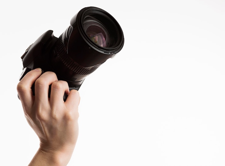Gratis Foto vooraanzicht van de camera van de handholding