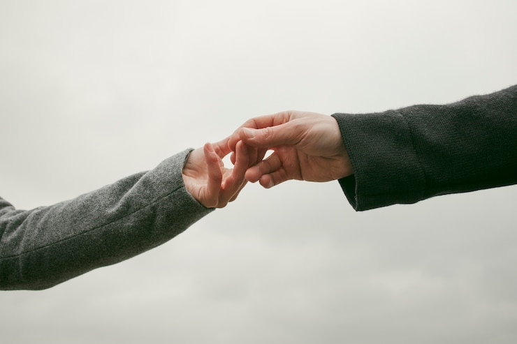 Gratis Foto vooraanzicht van het concept van paarhanden