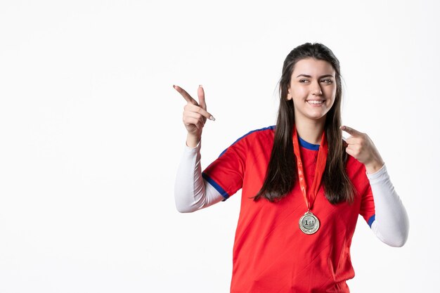 Vooraanzicht vrouwelijke speler met medaille