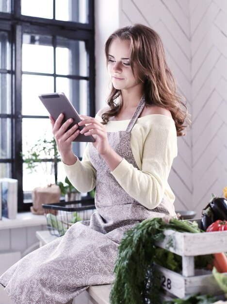 Vrouw in de keuken