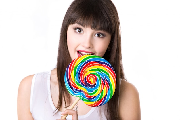 Gratis foto vrouw met een grote lolly