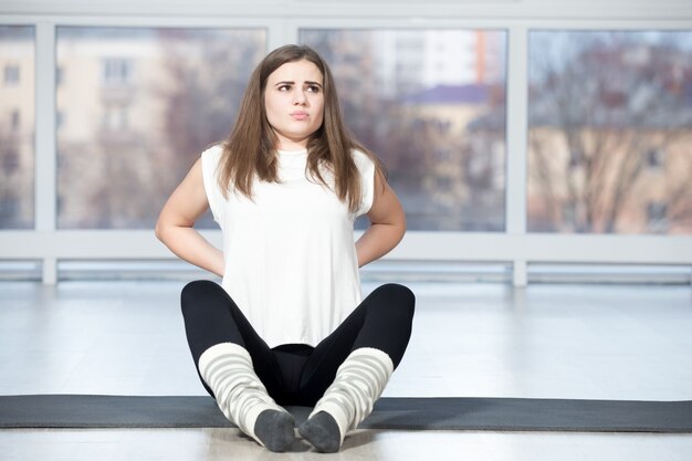 Vrouw met pijn in de rug