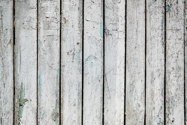 Wit geschilderde houtstructuur van houten muur voor achtergrond en textuur.