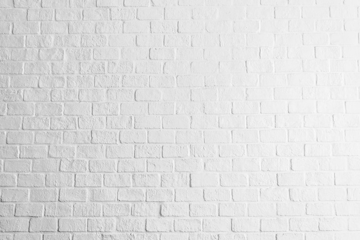 Gratis Foto witte bakstenen muurtexturen achtergrond
