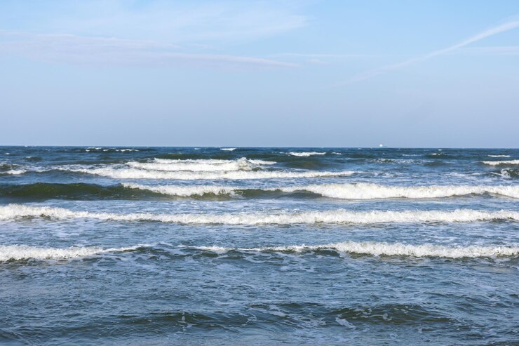 Gratis Foto zee golven achtergrond blauwe oceaan blauwe hemel