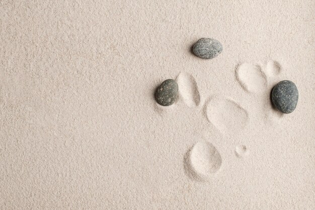 Zen stenen zand achtergrond gezondheid en wellness concept