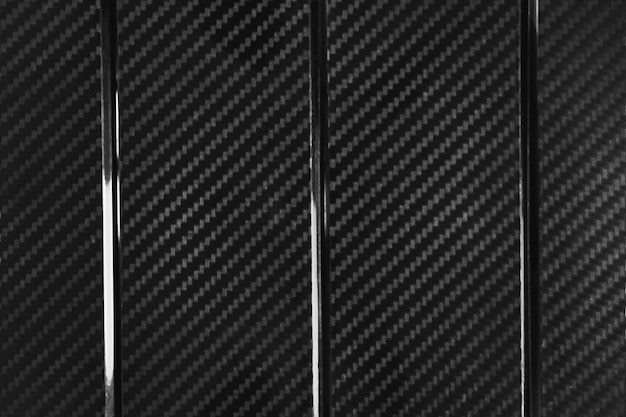Zwart grijze textuur met wazige focus en achtergrond donkerder rond de randen Plastic achtergrond voor splash screen of scherm