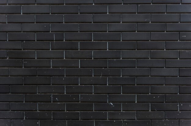 Zwarte bakstenen muur ontwerpruimte