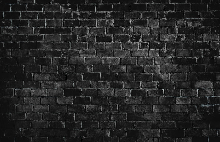 Gratis Foto zwarte geweven bakstenen muurachtergrond