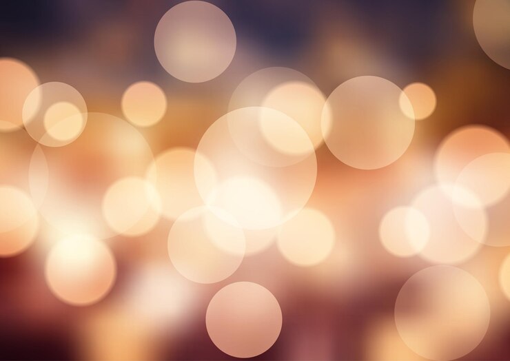 Gratis Vector abstracte achtergrond met een gouden bokeh lichtontwerp
