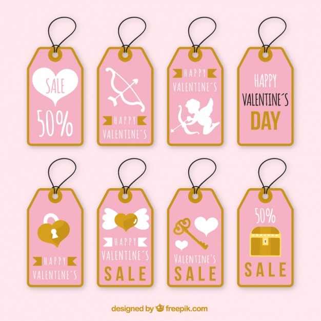 Gratis vector assortiment van roze etiketten met gouden details voor valentijnsdag