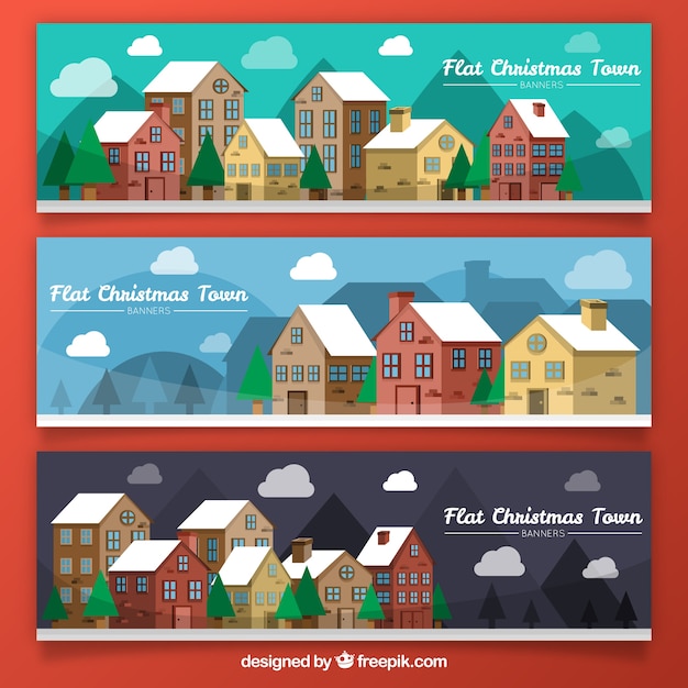 Gratis vector banners van de besneeuwde huizen in plat design