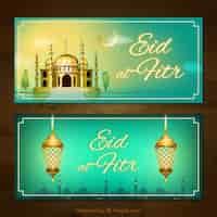 Gratis vector banners van eid al fitr met moskee en lampen