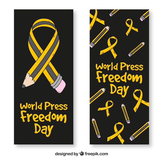 Black banners met potloden en linten voor de Dag van de persvrijheid