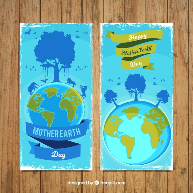 Gratis vector blauwe banners met groene informatie voor moeder aarde dag