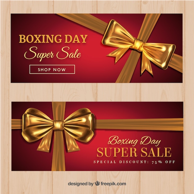 Gratis vector boxing day verkoop banners met gouden lint