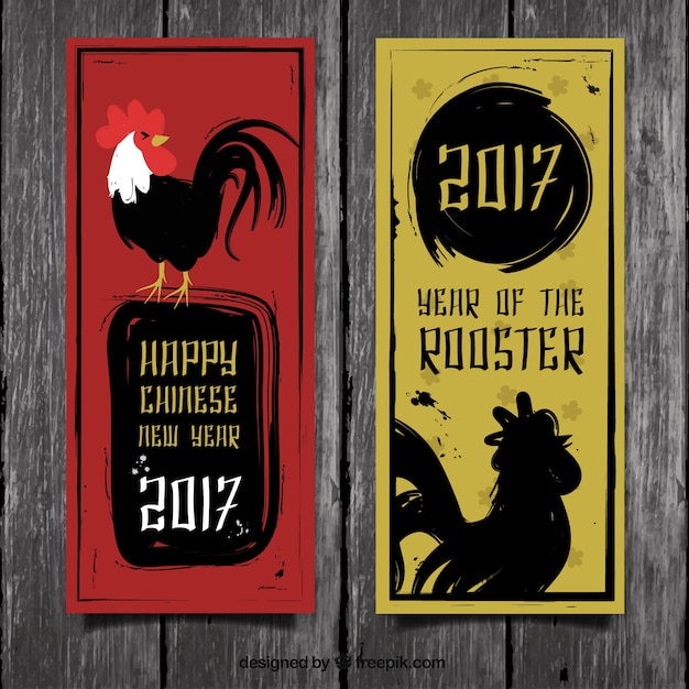 Gratis vector chinese nieuwe jaar banners met inkt hanen