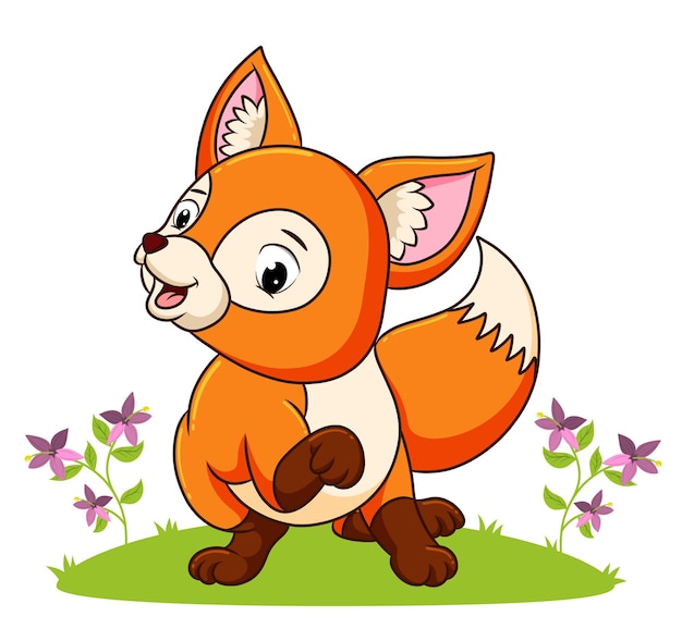 De vrolijke vos speelt in de tuin vol bloemen ter illustratie