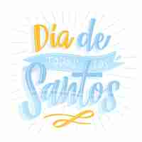 Gratis vector dia de todos los santos belettering met zonnestralen