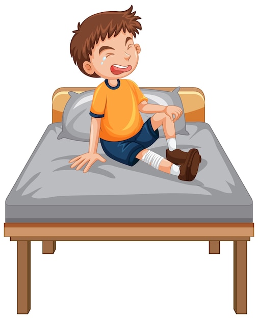 Een jongen met een gewond been huilend op het bed