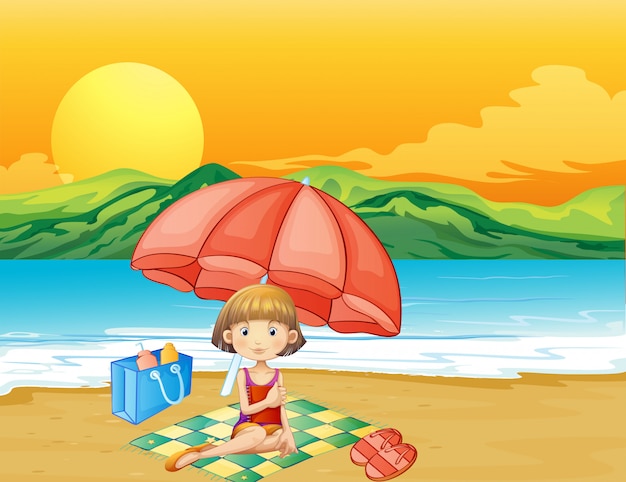 Een meisje met een boek op het strand