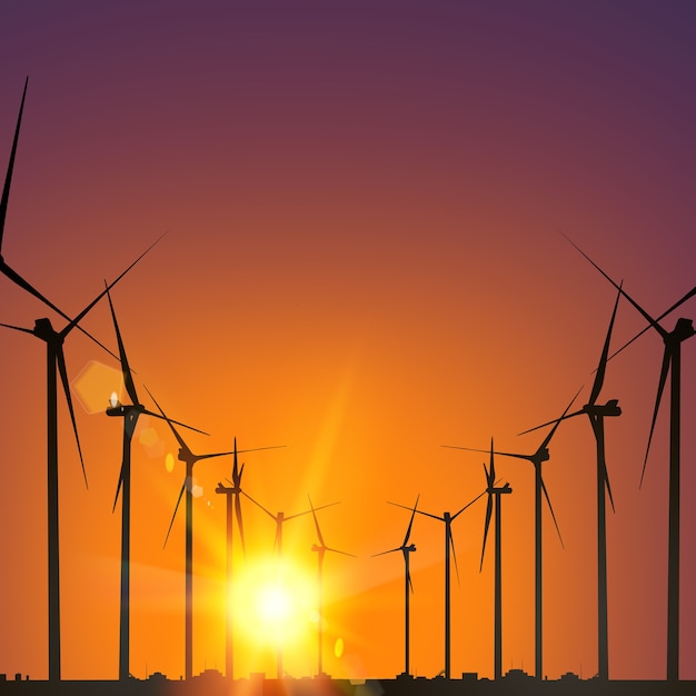 Elektrische windmolengeneratoren tijdens zonsondergang.