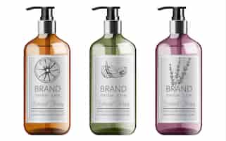 Gratis vector flessen biologische shampoo met kruidenverzorging. diverse planten en kleuren. munt, sinaasappel en lavendel