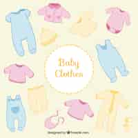 Gratis vector gekleurde baby shower kleren